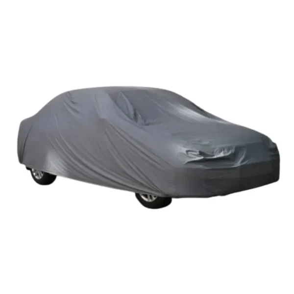 Bâche locale voiture anti poussière Voiture entièrement recouverte d’une housse de protection bleu foncé, ajustée autour du véhicule avec les roues partiellement visibles.