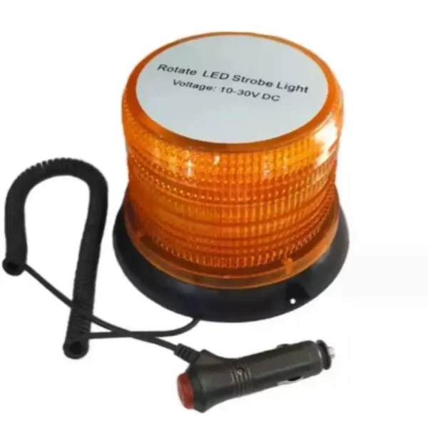Une lampe stroboscopique LED rotative ambrée, avec une étiquette blanche indiquant « Rotate LED Strobe Light 10-30VDC », posée sur une surface blanche perforée. Le boîtier de la lampe est transparent et texturé.